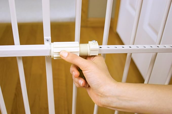 Carlson 24-38" Lil Tuffy Expandable Metal Dog Gate for Doorways, Indoor Pet Gate with Small Pet Door, No-Drill Pressure Mount, White