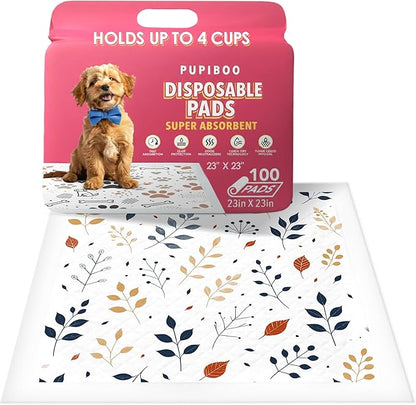 Pupiboo Disposable Dog and Cat Training Pads – Leaves Pattern, Highly Absorbent Pee Pads, Leak Proof Backing, Pheromonal Attractant for Housebreaking & Potty Training – 23x23 in (100 Count)