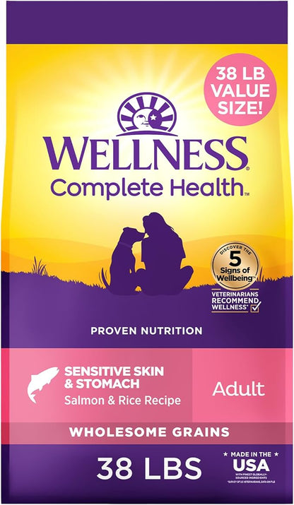 Wellness Complete Health Sensitive Skin and Stomach Dry Dog Food, Wholesome Grain Kibble, Natural, Chicken Free, Salmon and Rice Recipe, 38 lb Bag